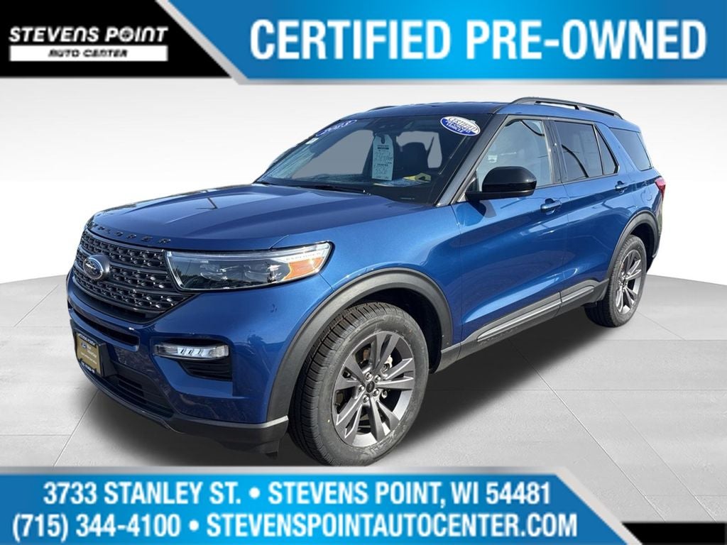2023 Ford Explorer XLT in Atlas Blue Metallic — front three-quarter view